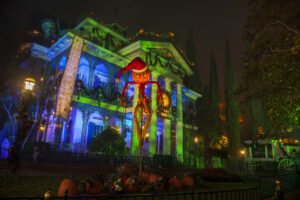 Haunted Mansion Holiday at Disneyland Park in Anaheim, Calif., will feature a merry makeover of the beloved eerie estate. Jack Skellington is behind the mayhem, decorating the mansion with frightfully festive touches inspired by “Tim Burton’s The Nightmare Before Christmas.” As the attraction’s reimagined queue experience continues to materialize, Haunted Mansion Holiday will be available via virtual queue only when it reopens just in time for the fall season. (Paul Hiffmeyer/Disneyland)