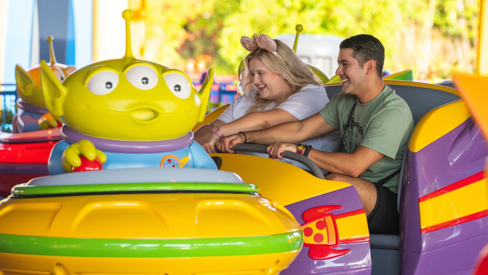 Guests ride Alien Swirling Saucers in Toy Story Land at Disney's Hollywood Studios