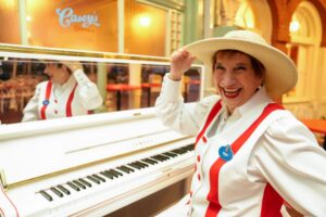 Carol, the new Casey's Corner pianist at Magic Kingdom