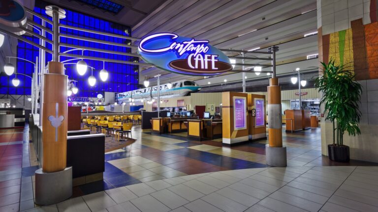 Contempo Café inside Disney's Contemporary Resort with the monorail gliding through nearby