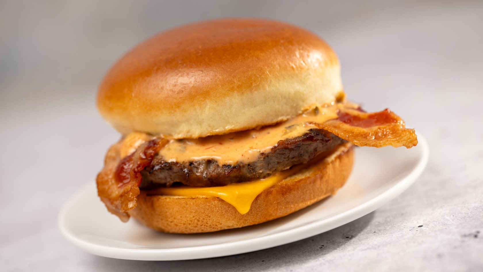 A One Third Pound Angus Bacon Cheeseburger with Sonny Eclipse Signature Sauce