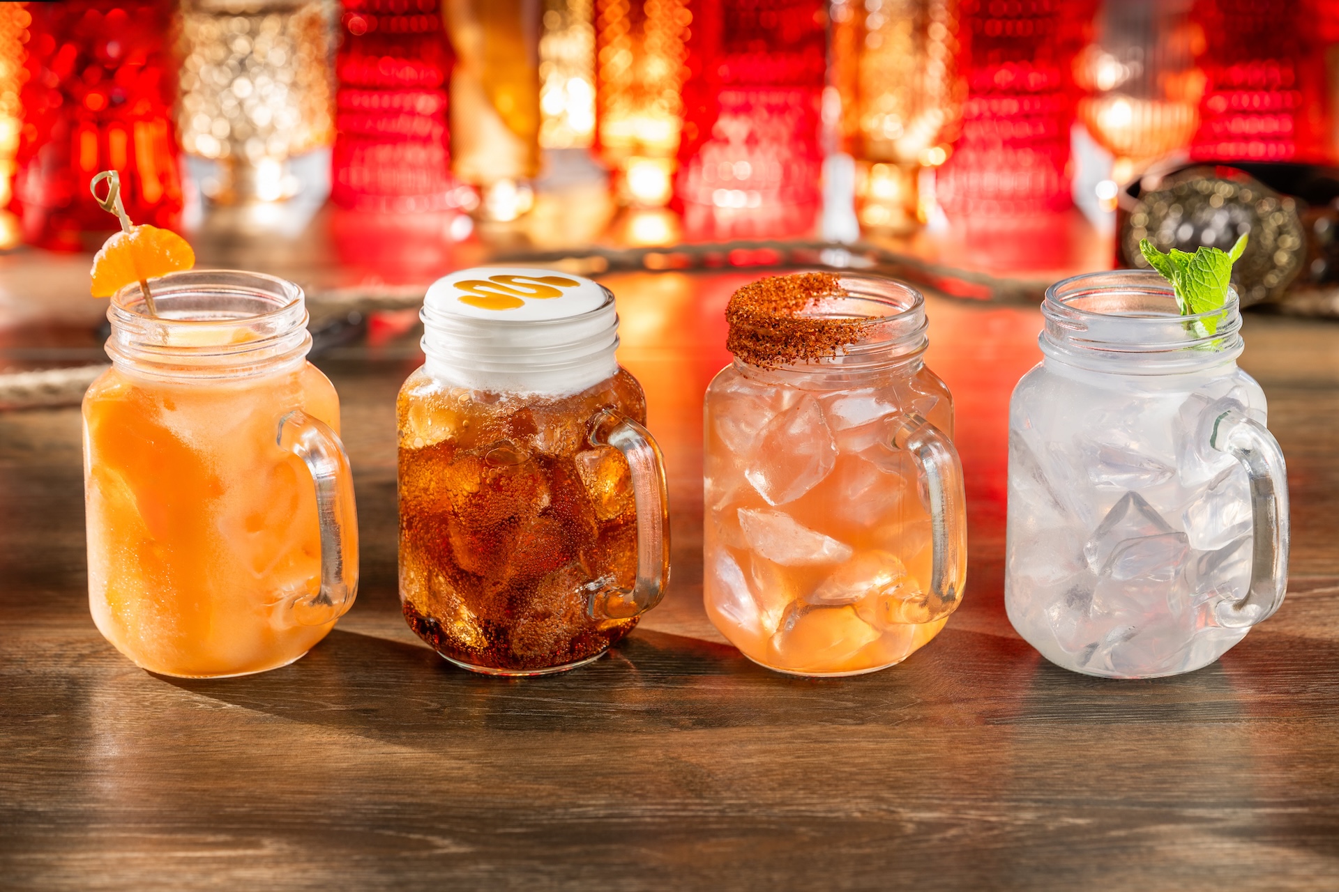Four drinks from The Diamond Horseshoe pop-up menu at Magic Kingdom