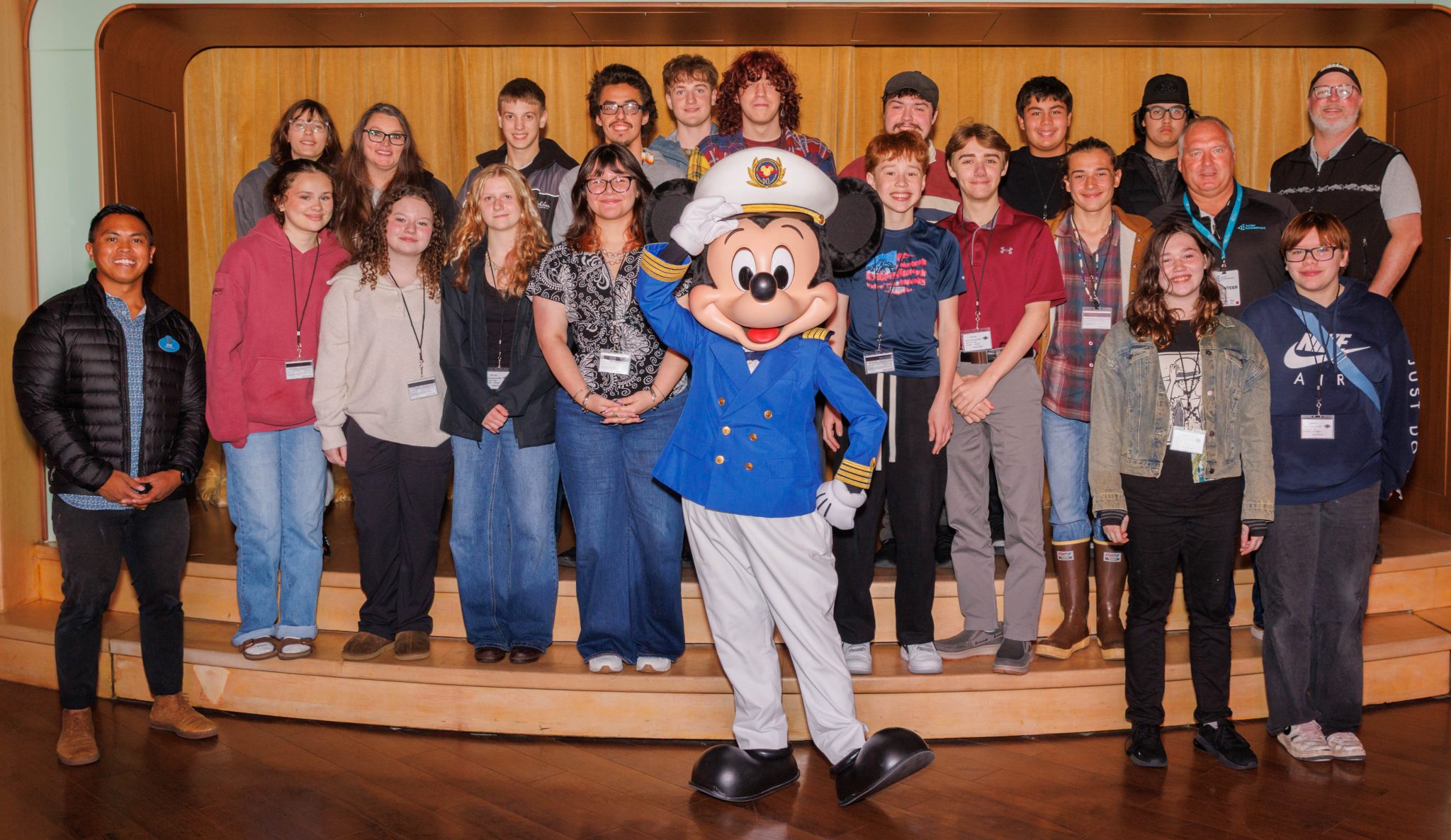 Captain Mickey Mouse poses with a group of students during Disney Cruise Line's 2026 Southeast Alaska community events
