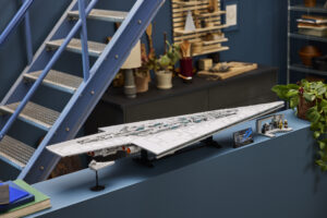 LEGO Star Wars Executor Super Star Destroyer set 75457 displayed on a shelf with its companion Star Destroyer and bridge minifigure scene