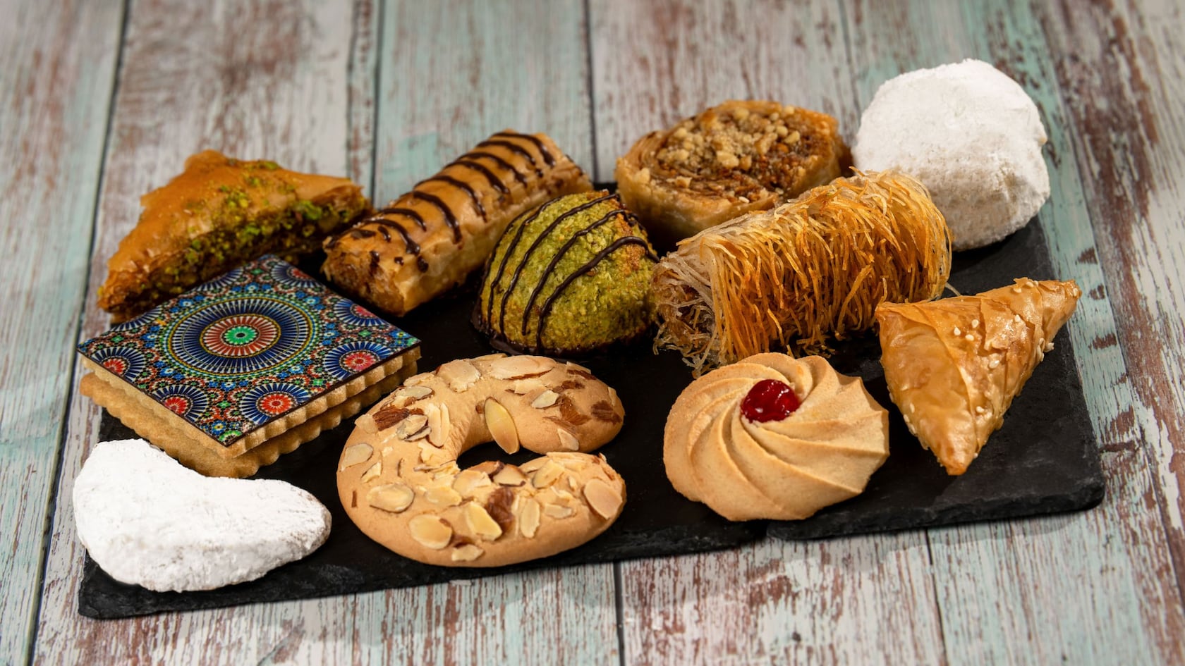 A platter of assorted cookies and pastries from Oasis Sweets & Sips at Epcot
