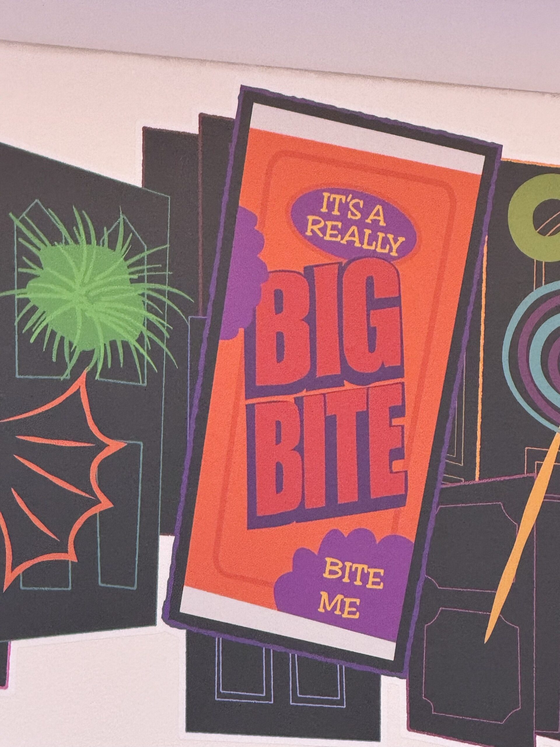 It's A Really Big Bite candy wrapper artwork reading Bite Me at Pixar Place Hotel