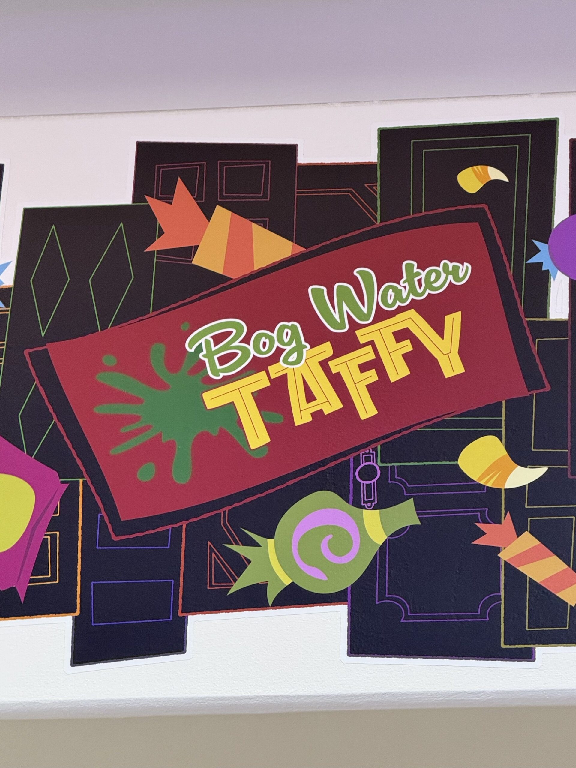 Bog Water Taffy candy wrapper artwork at Pixar Place Hotel