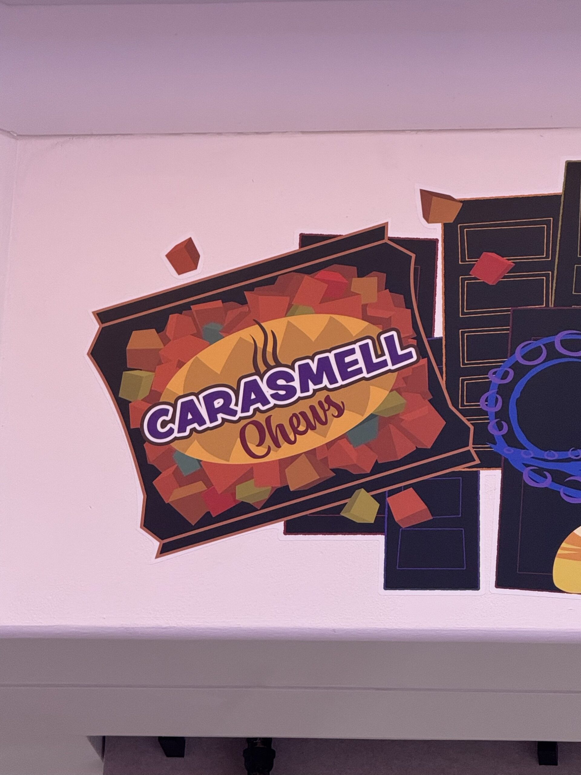 Carasmell Chews candy wrapper artwork at Pixar Place Hotel