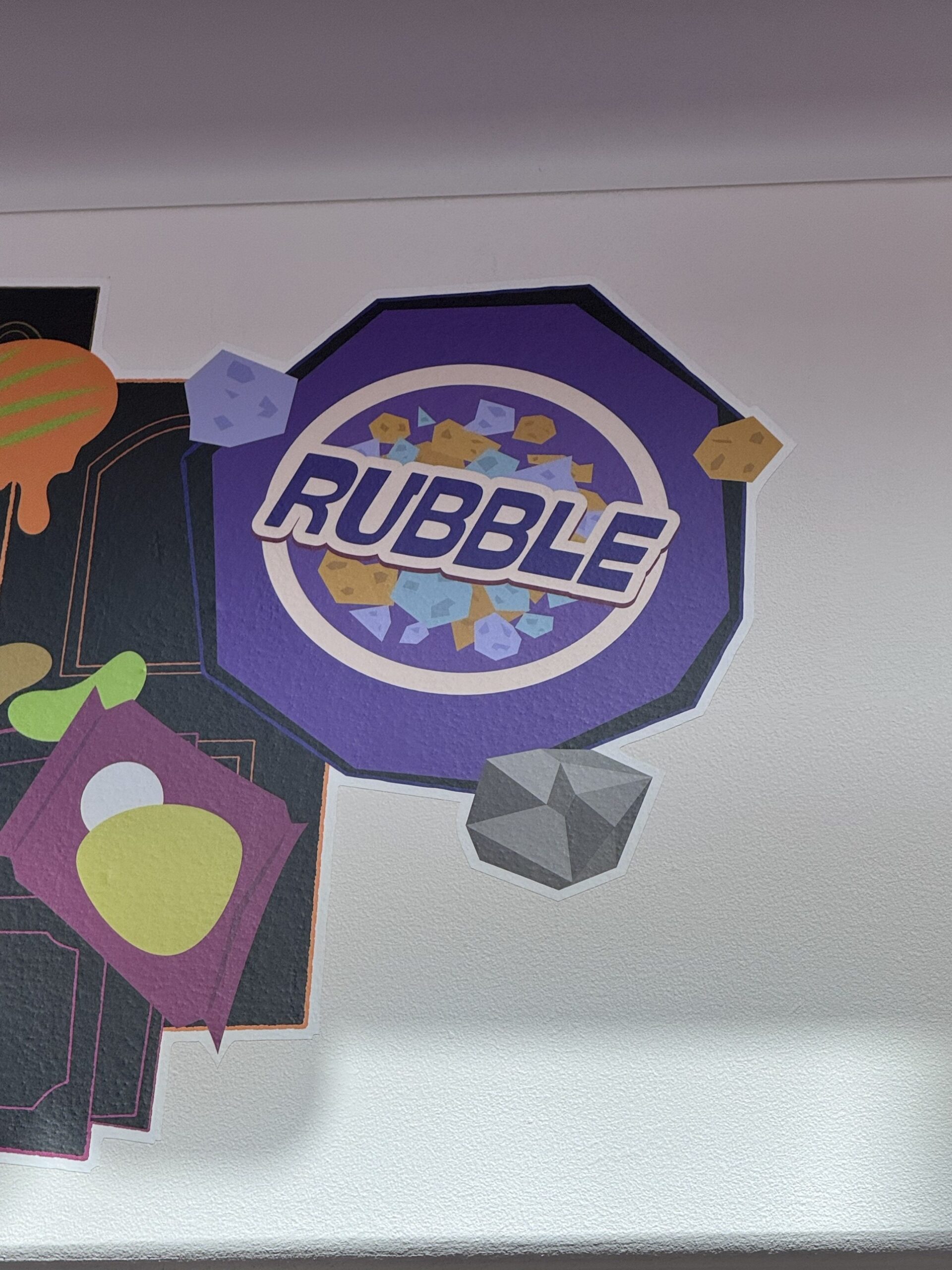 Rubble candy label artwork with rock-shaped candy at Pixar Place Hotel