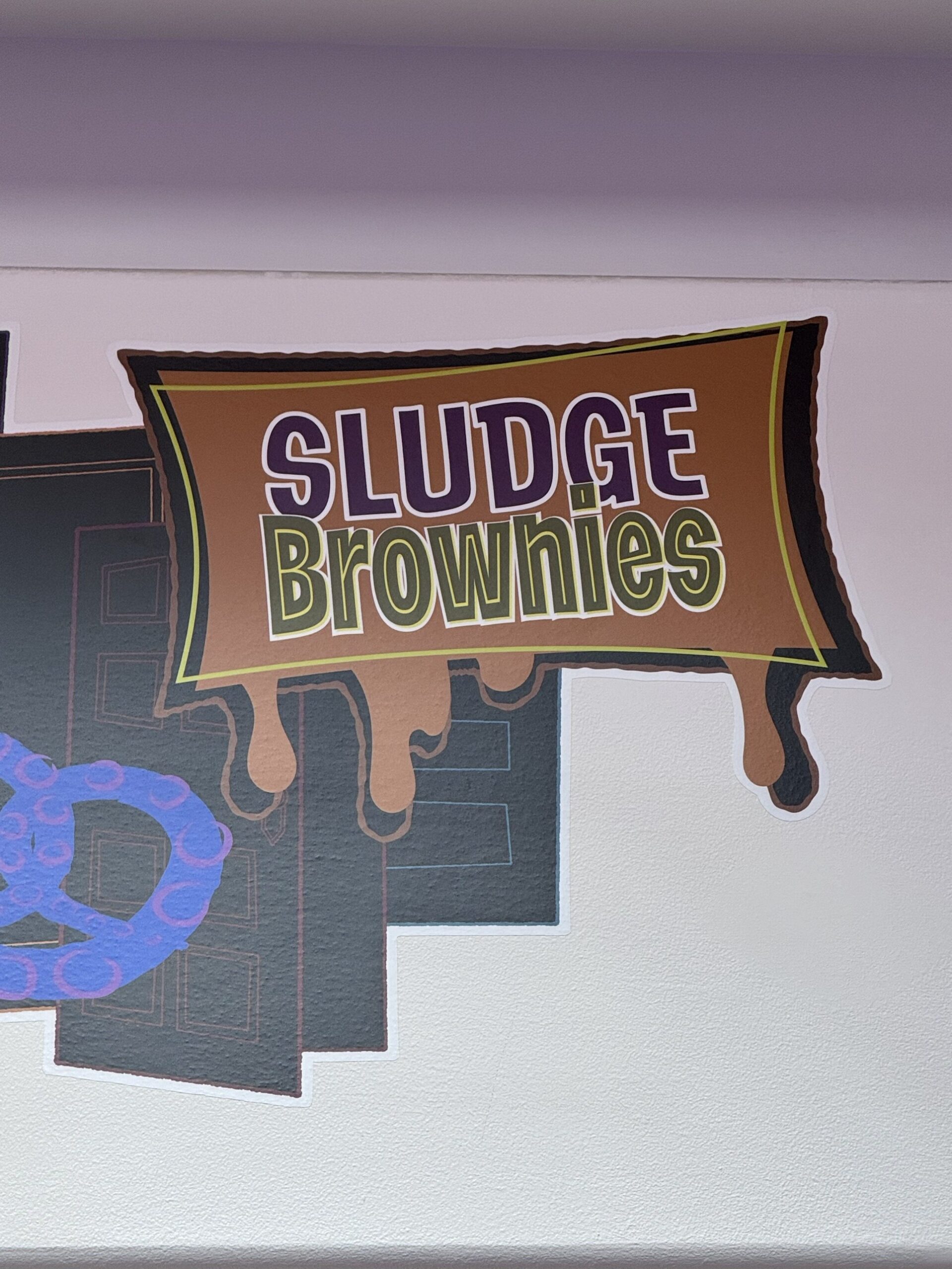 Dripping Sludge Brownies candy label artwork at Pixar Place Hotel