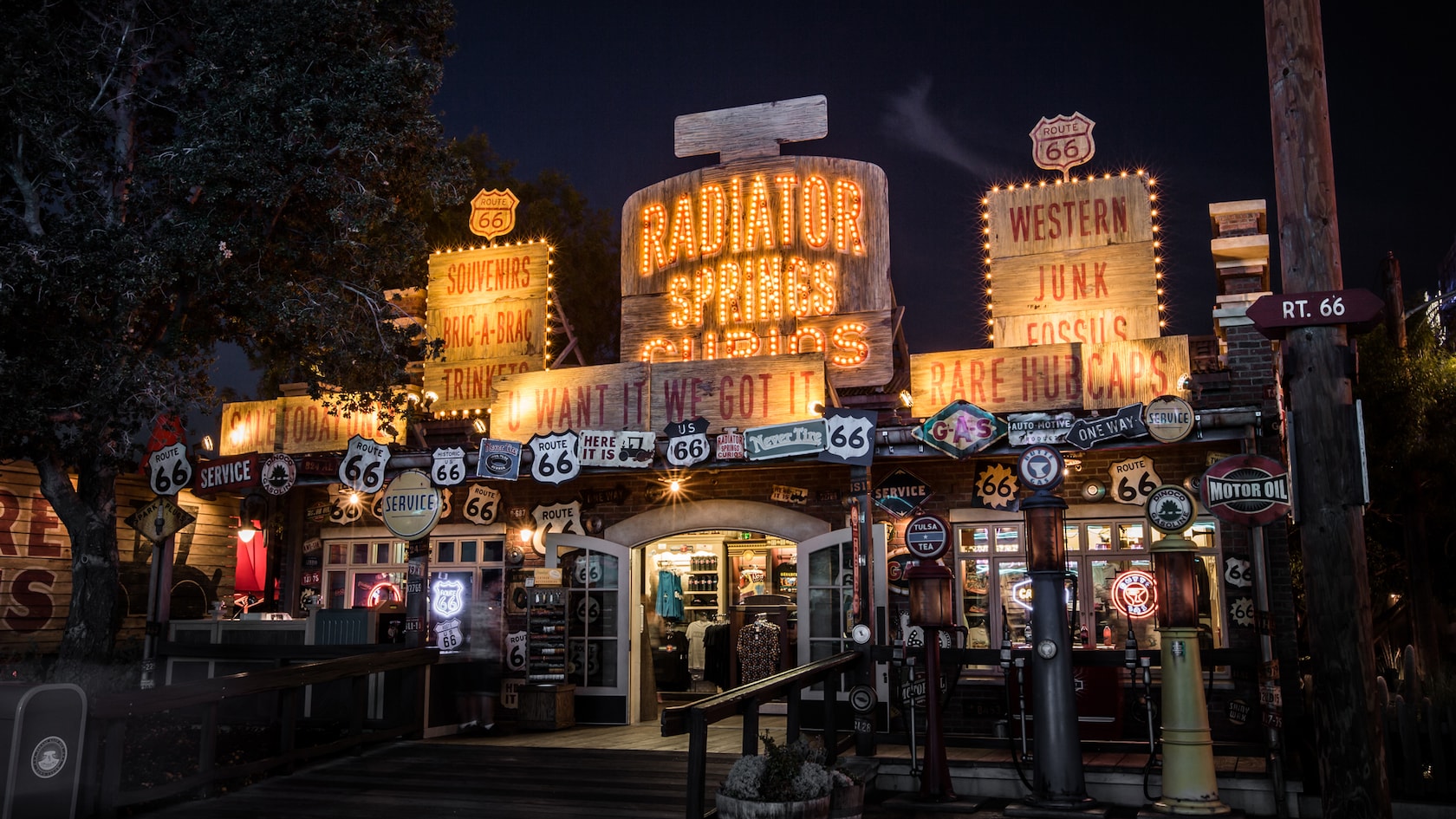 Radiator Springs Curios shop in Cars Land at Disney California Adventure, lit up at night