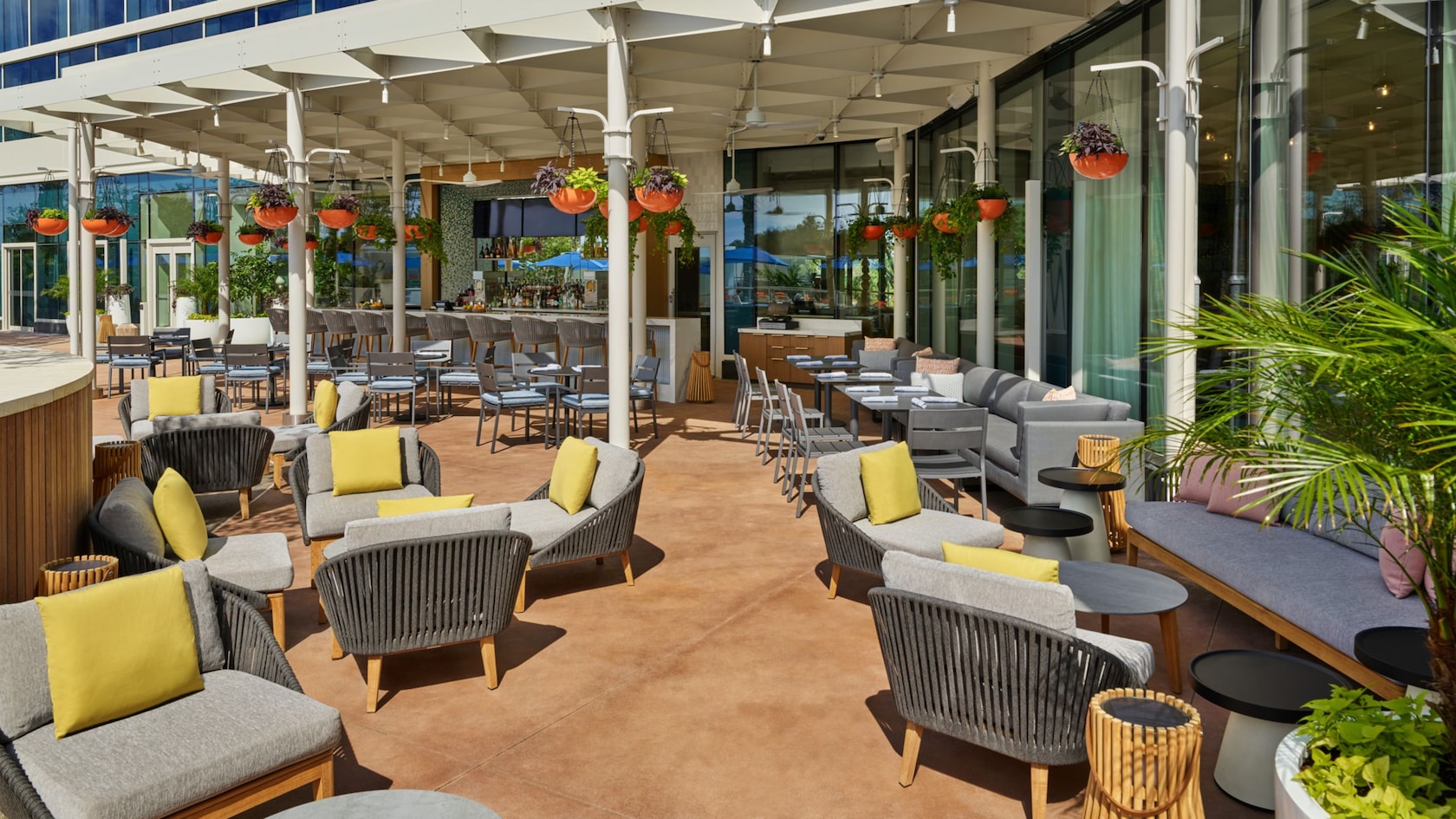 An outdoor bar and lounge area at the Walt Disney World Swan Reserve