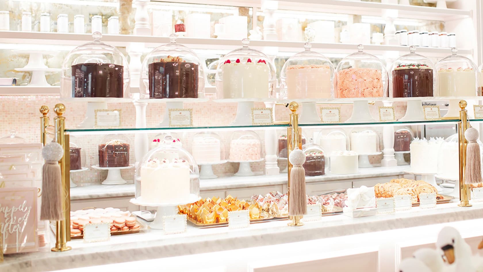 Counters lined with cakes, cookies and other enticing baked goods at The Cake Bake Shop on Disney’s Boardwalk