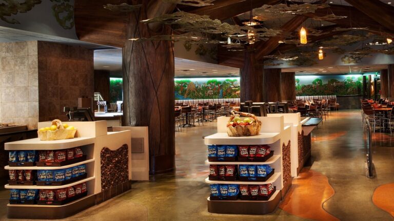Cashier station and checkout line at The Mara, also with tree canopy ceiling