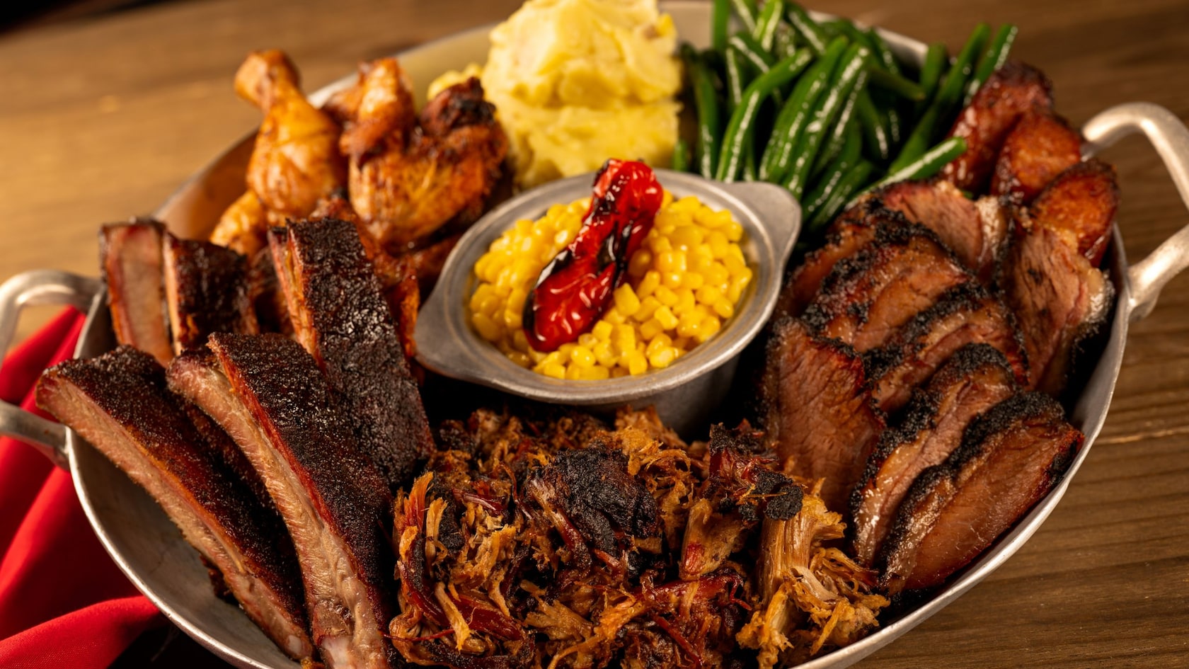 The Pig, one of Whispering Canyon Café signature skillets with pork ribs, pork belly, pulled pork, pig wings and side dishes at Disney's Wilderness Lodge