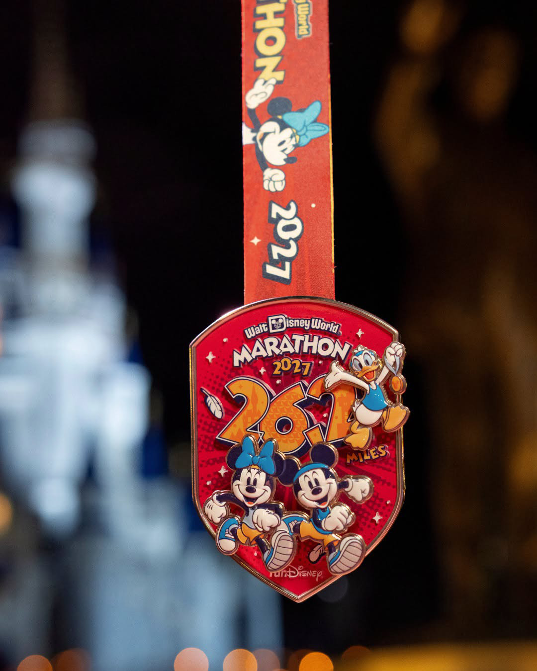 2027 Walt Disney World Marathon medal with Mickey, Minnie and Donald