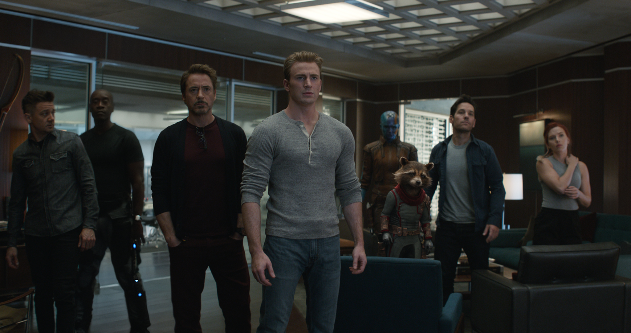 Hawkeye, War Machine, Tony Stark, Steve Rogers, Nebula, Rocket, Scott Lang and Natasha Romanoff stand together in a still from Avengers: Endgame
