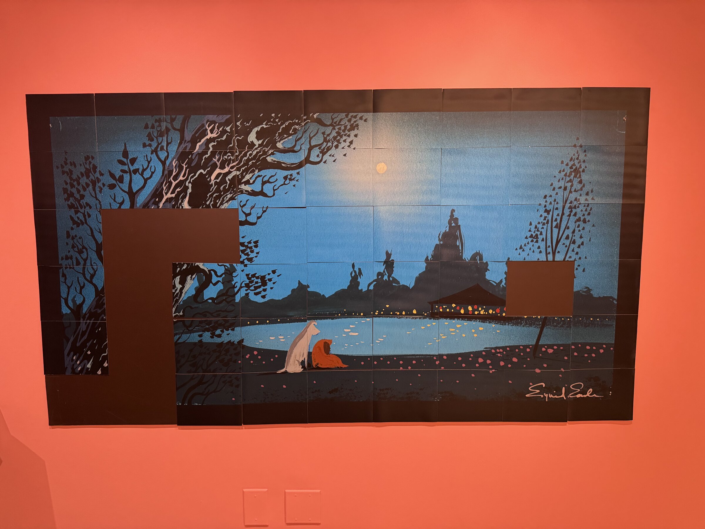 A large magnetic puzzle on a coral wall recreating Eyvind Earle's moonlit Lady and the Tramp concept art, with pieces missing