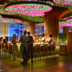 Artist rendering of the Branch & Brush lounge at Disney's Lakeshore Lodge, with a curved bar, glowing leaf canopy ceiling and windows overlooking Bay Lake