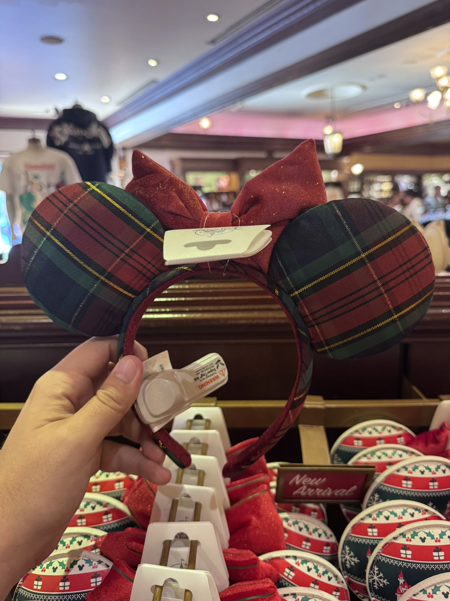 Back view of the green and red plaid Christmas Minnie ears at the Emporium at Disneyland