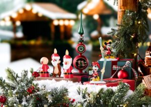Mickey Mouse Family Christmas holiday decor including Dale light-up candle figures and a Santa Mickey and Minnie tree topper