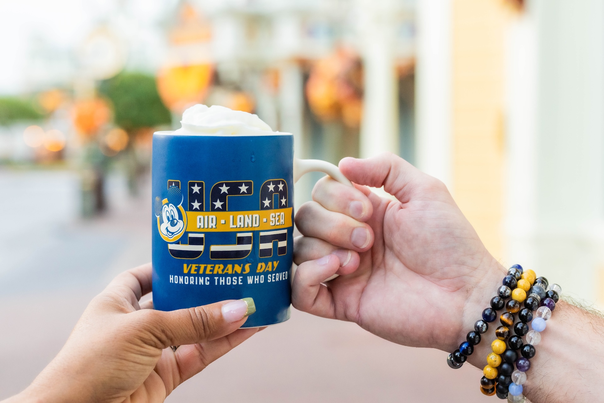 Blue 2026 Disney Veterans Day mug with Mickey Mouse and Air Land Sea lettering