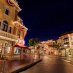 Main Street, U.S.A. at Disneyland at night, pictured for the resort's Cypress purchase; the photo shows Disneyland, not the former Yamaha campus