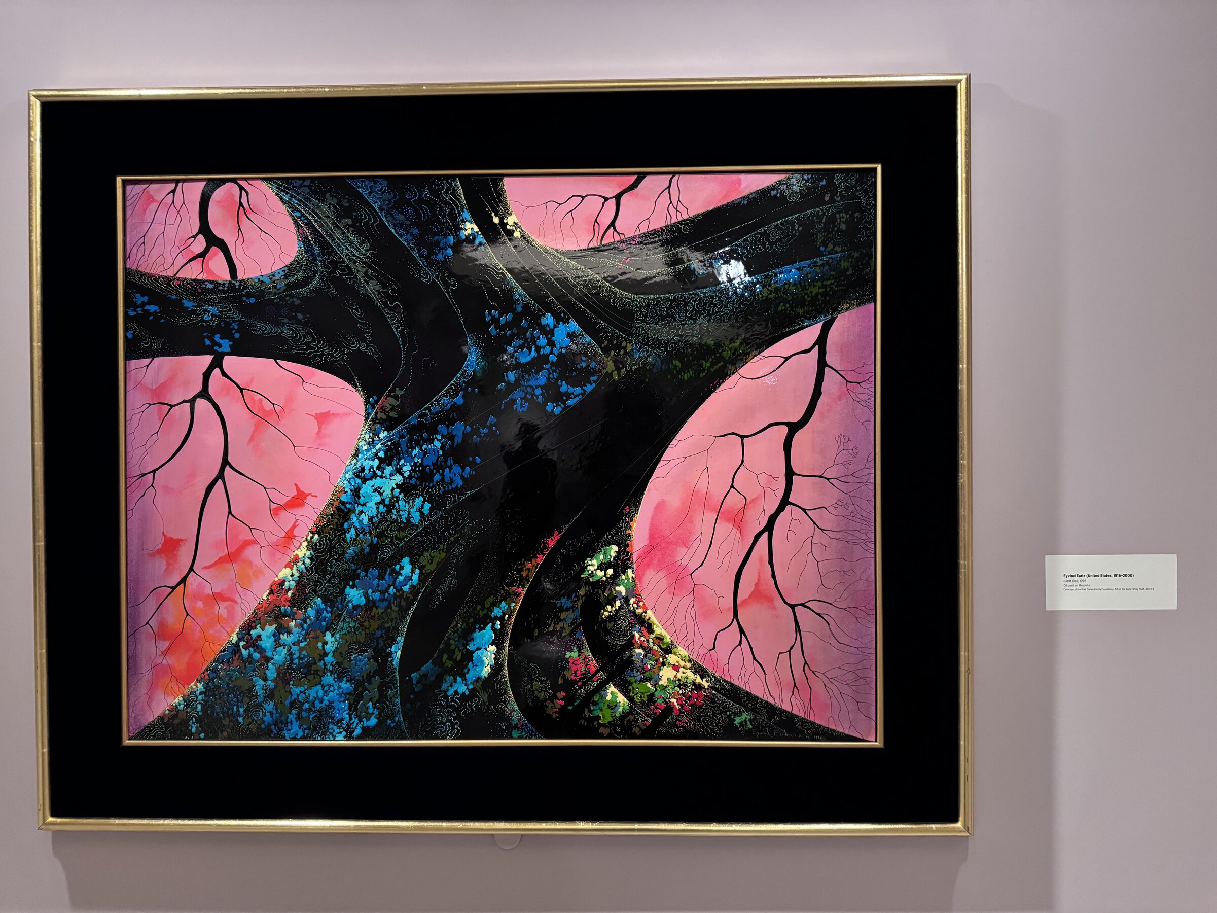 Eyvind Earle's Giant Oak, a 1996 oil painting of a massive dark oak trunk against a pink sky