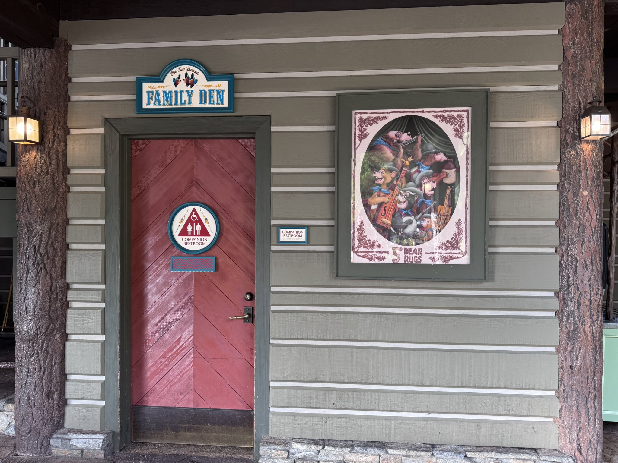Family Den companion restroom with Country Bears theming at Hungry Bear Barbecue Jamboree