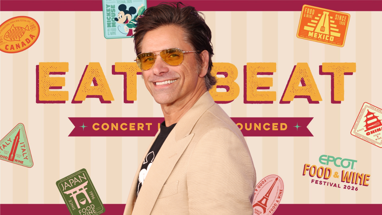 John Stamos in front of EPCOT's Eat to the Beat concert series artwork