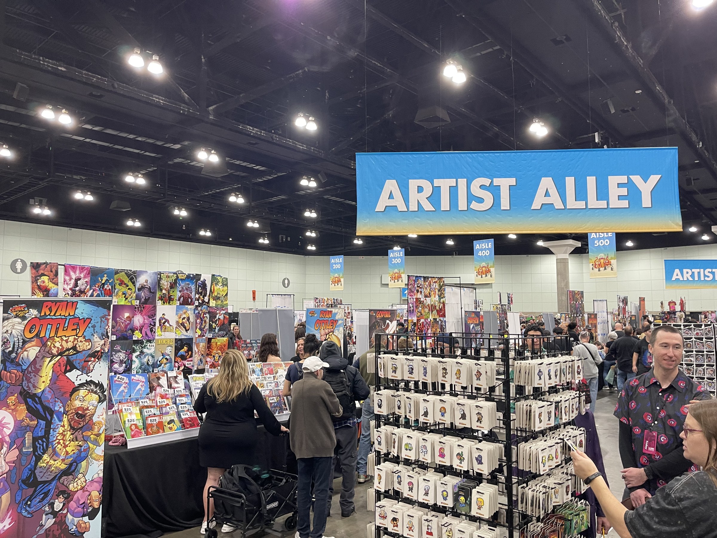 The Artist Alley sign above rows of artist tables at L.A. Comic Con 2026