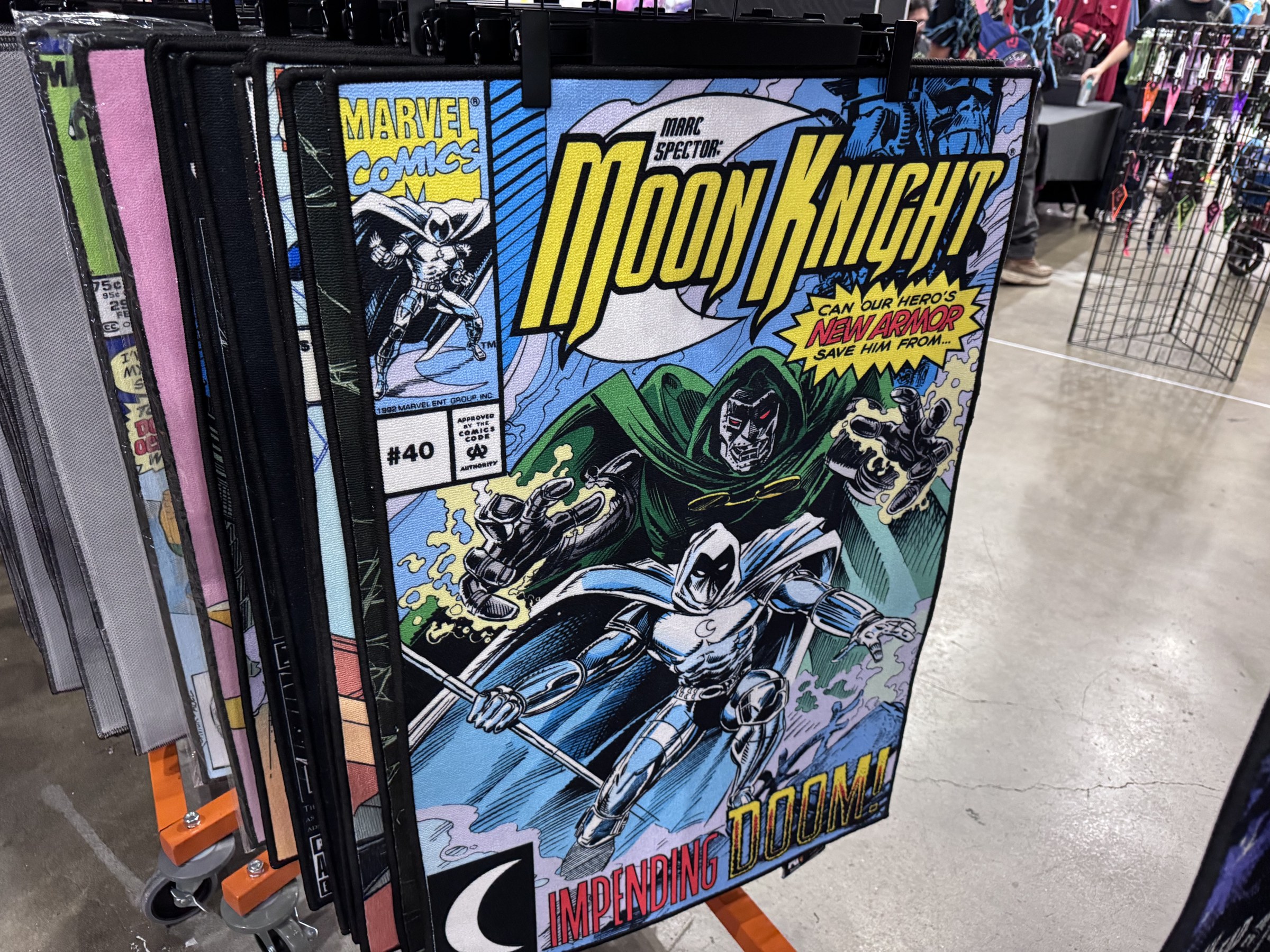 A rug printed with the Marc Spector: Moon Knight #40 cover showing Moon Knight and Doctor Doom