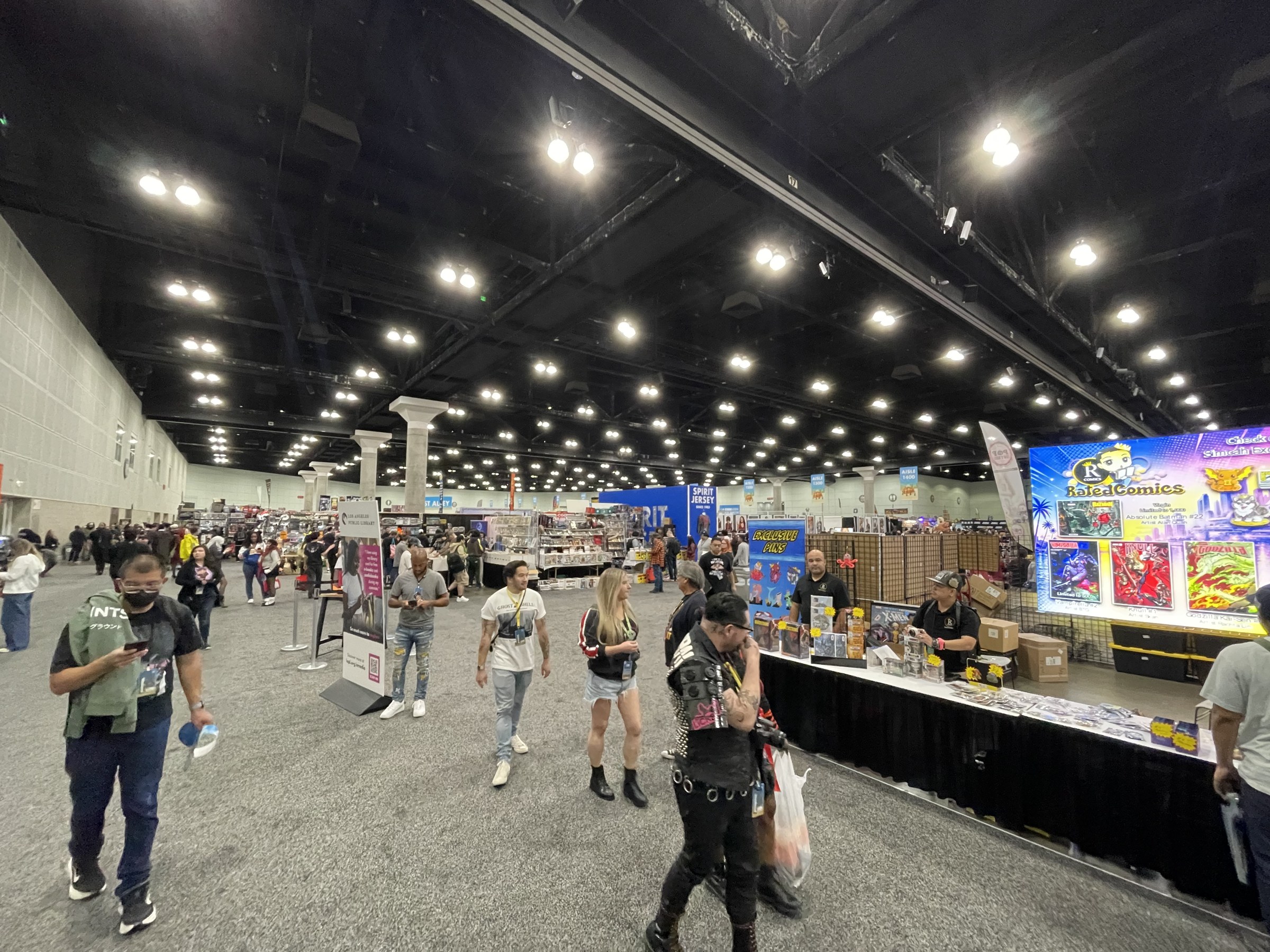 Fans walk the L.A. Comic Con 2026 show floor on Friday