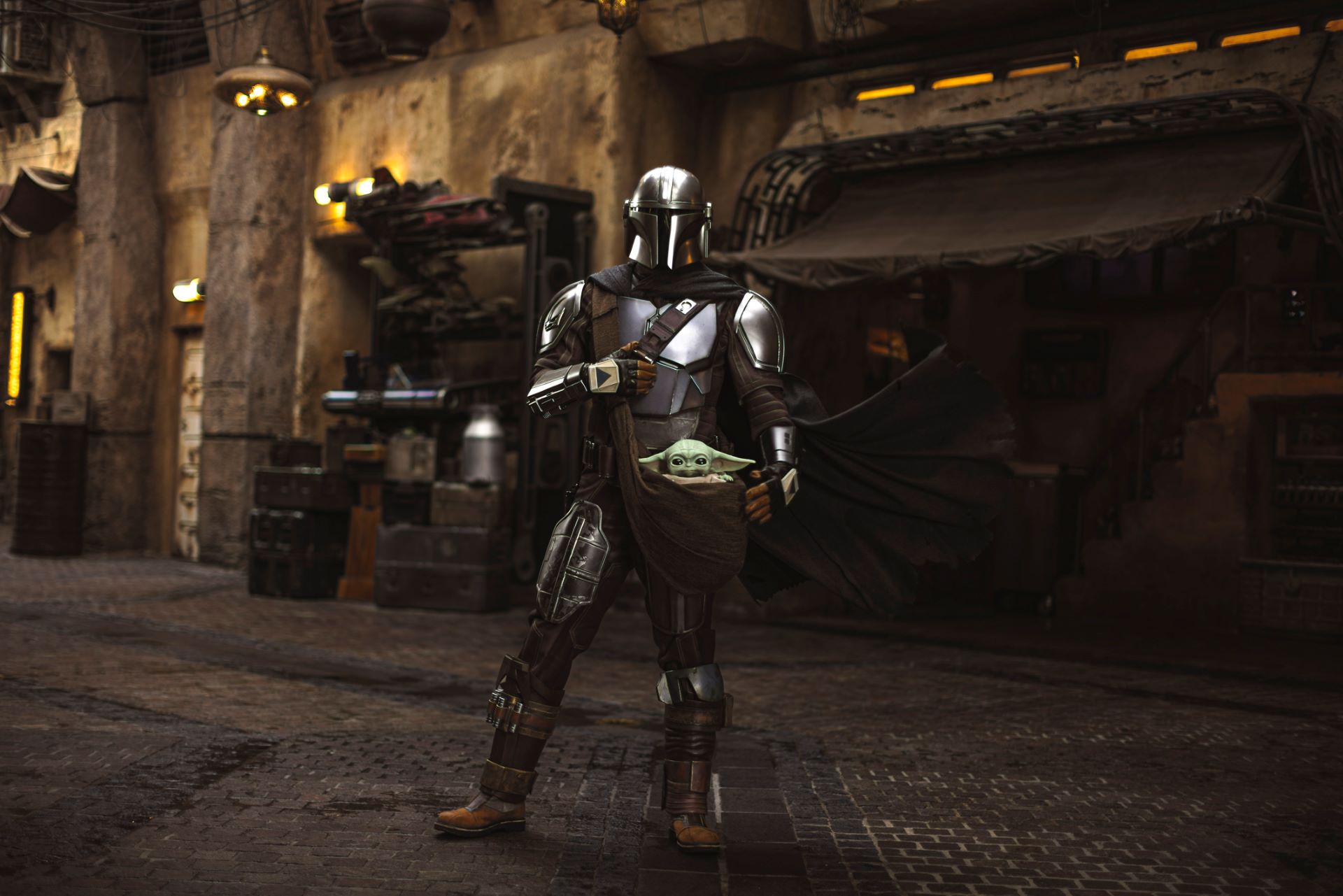 The Mandalorian and Grogu in Star Wars: Galaxy's Edge