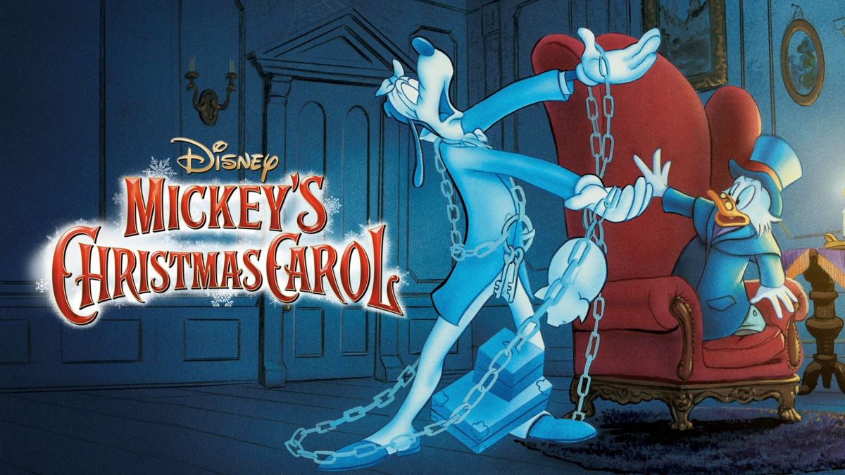 Mickey's Christmas Carol key art with Goofy as Marley's ghost in chains and Scrooge McDuck in a red armchair