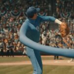 Pedro Pascal's Mister Fantastic in a blue Fantastic Four baseball uniform stretching his arm to throw the first pitch at Ebbets Field
