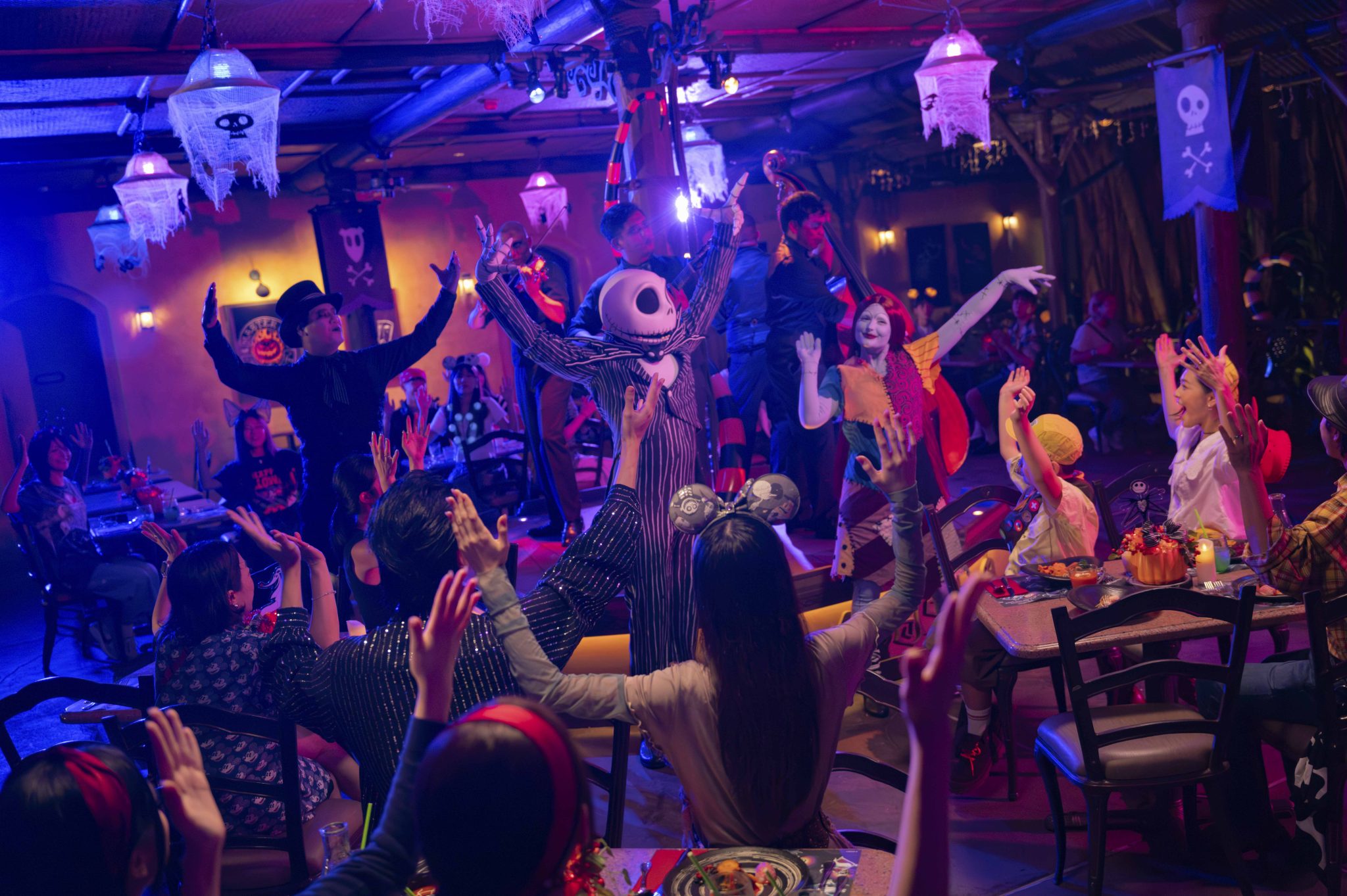 Jack Skellington and Sally with guests at The Nightmare Before Dinner at River View Cafe, Hong Kong Disneyland