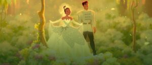 Tiana in a green gown and Prince Naveen walking together through the bayou in The Princess and the Frog