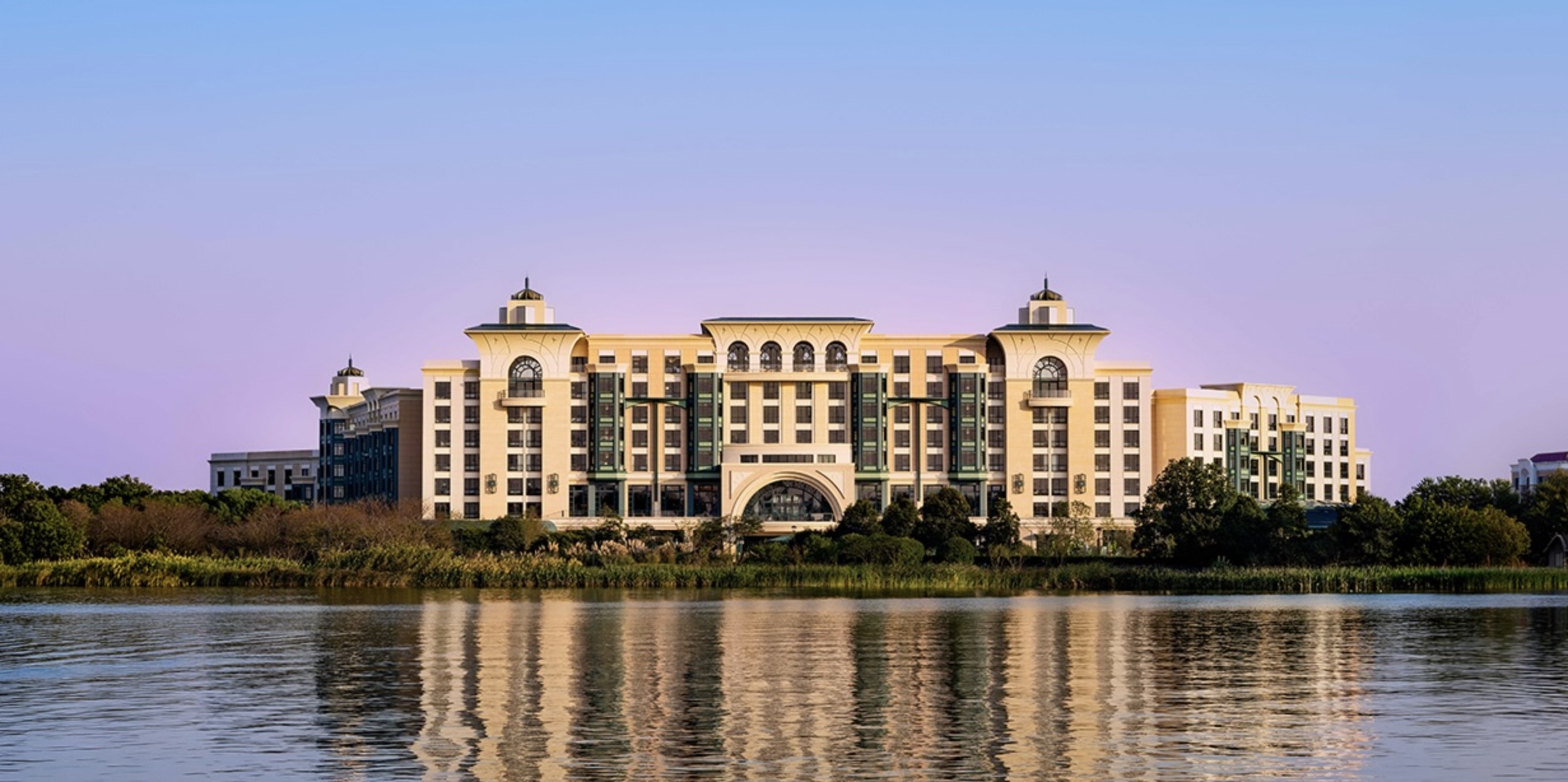 Exterior of the Shanghai Disney Enchanted Star Hotel across the lake at Shanghai Disney Resort