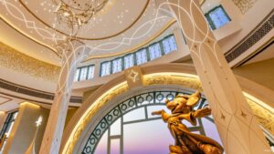 Golden Sorcerer Mickey statue in the lobby of the Shanghai Disney Enchanted Star Hotel