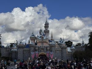 Sleeping Beauty Castle at Disneyland with snow and icicles on its towers
