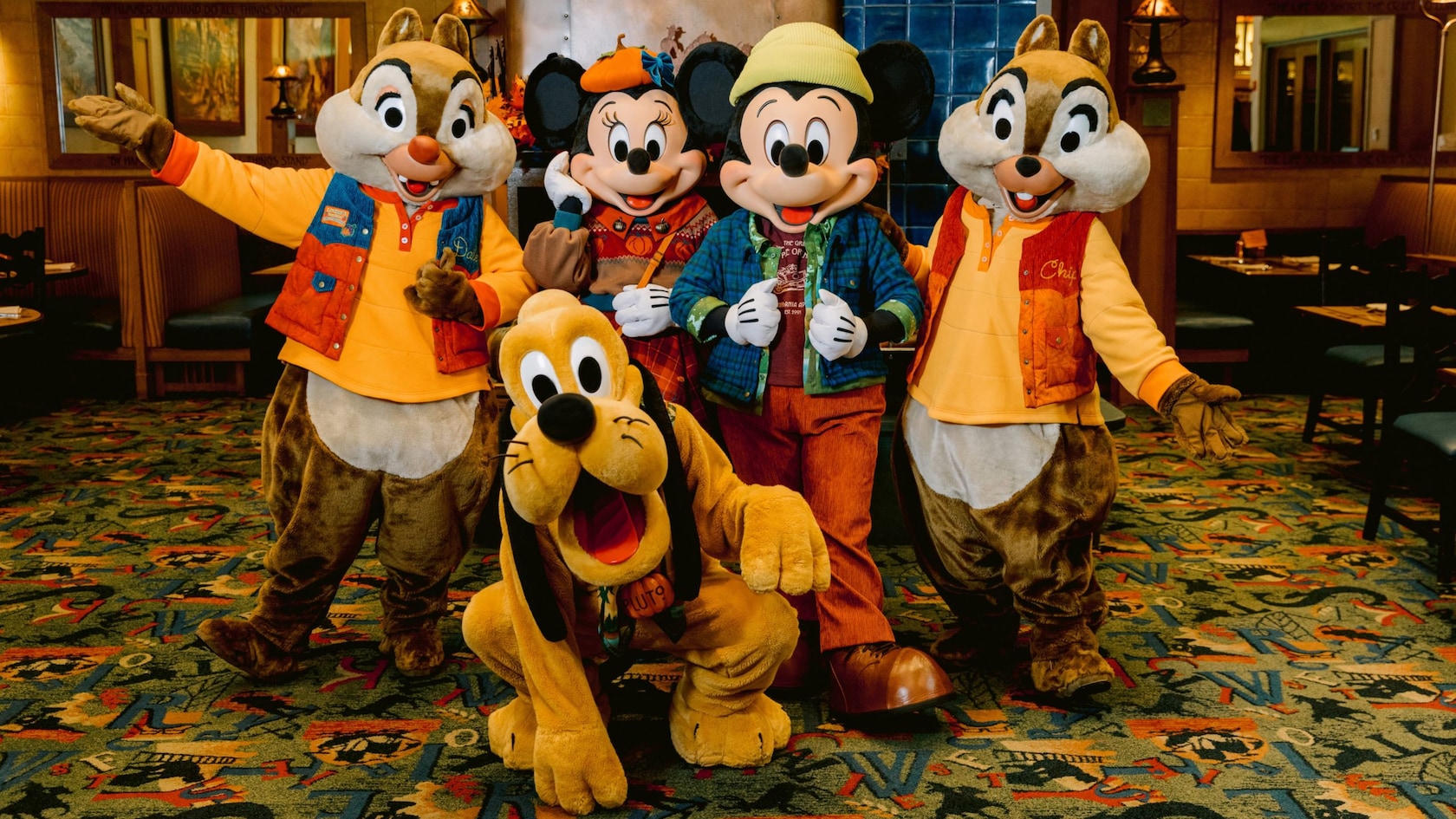 Mickey Mouse, Minnie Mouse, Pluto, Chip and Dale in fall outfits inside Storytellers Cafe at Disney's Grand Californian Hotel