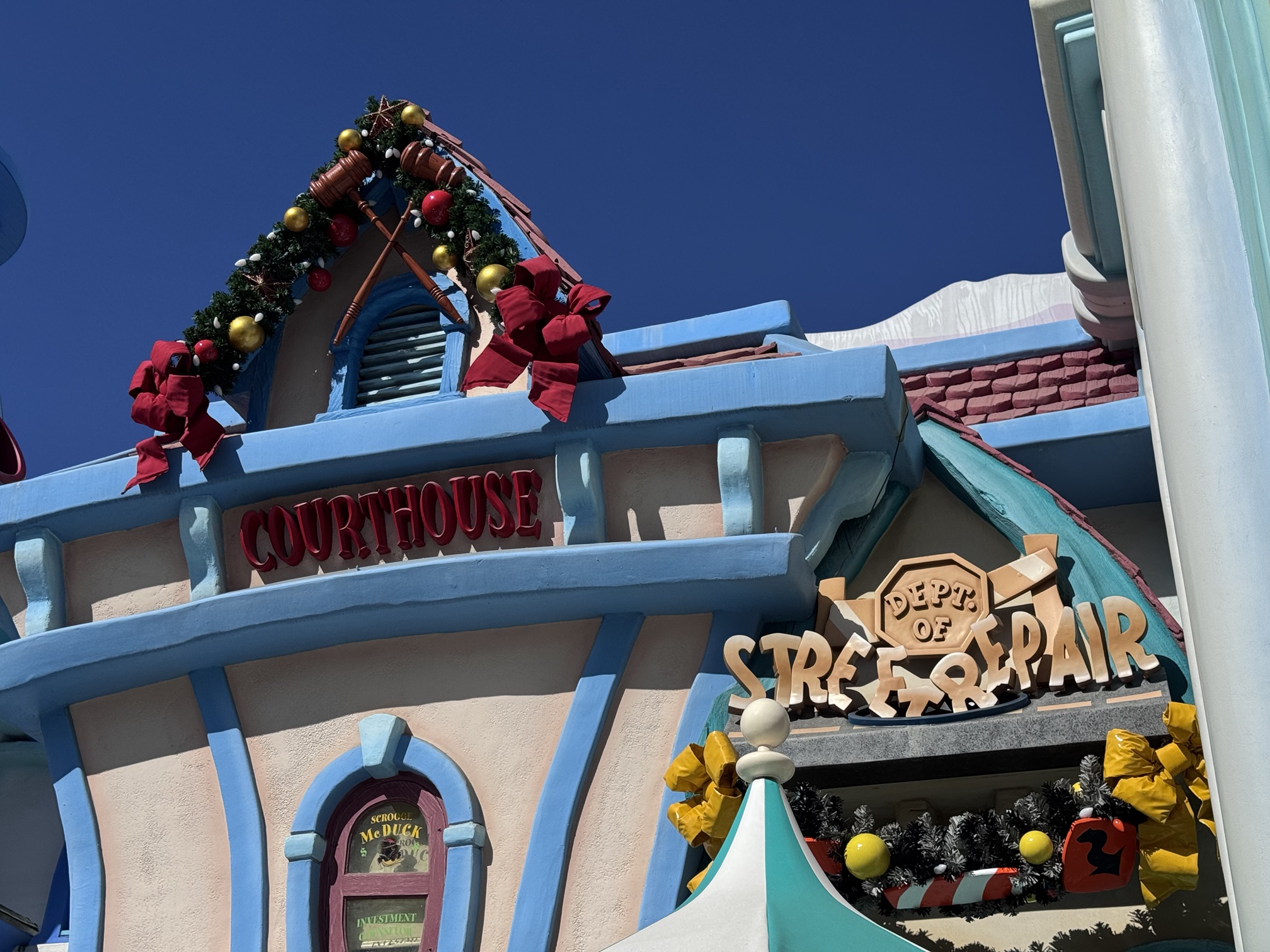 Christmas garland with gavels on the Courthouse in Mickey's Toontown at Disneyland