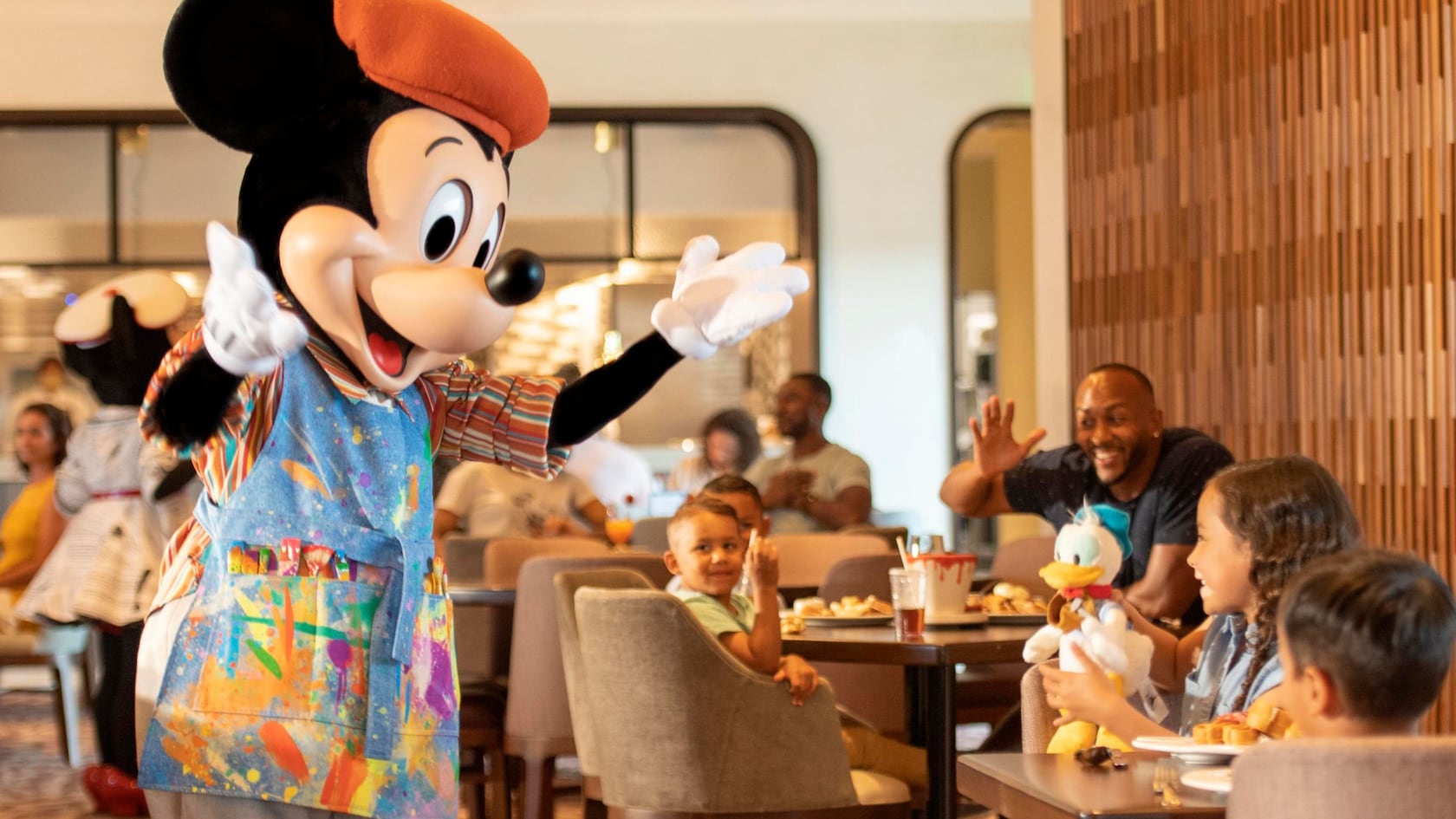 Mickey Mouse greets families at the Topolino's Terrace character breakfast