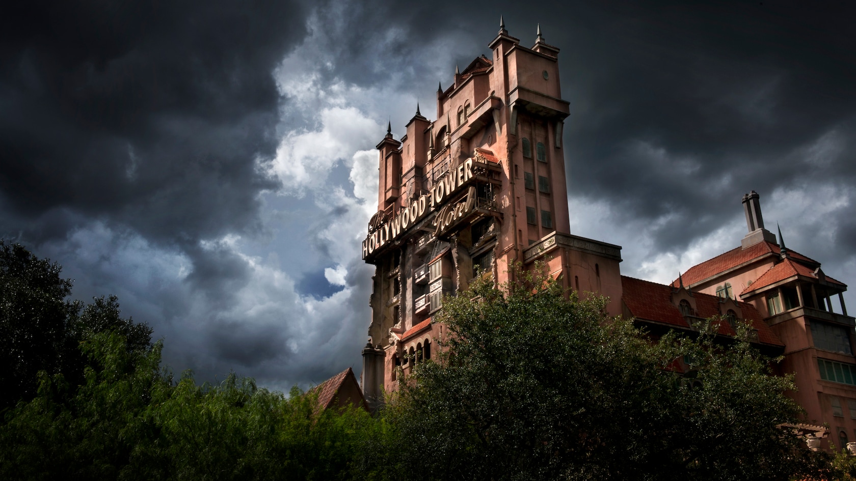 The Hollywood Tower Hotel, home of The Twilight Zone Tower of Terror at Disney's Hollywood Studios, under a stormy sky