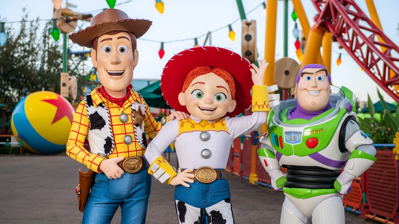 Woody, Jessie and Buzz Lightyear greeting guests in Toy Story Land at Disney's Hollywood Studios